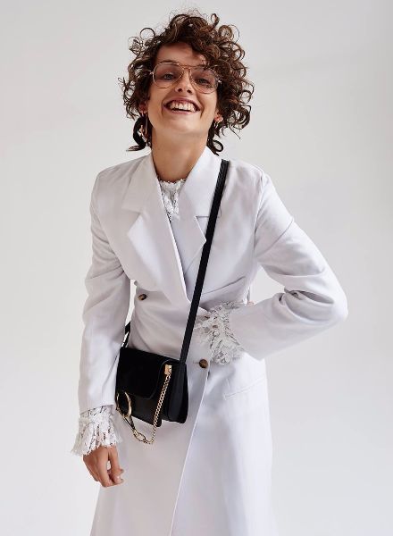 Fashion editorial in ELLE Poland starring LOUISA MODEL Julia S., with photos by Marcin Kempski