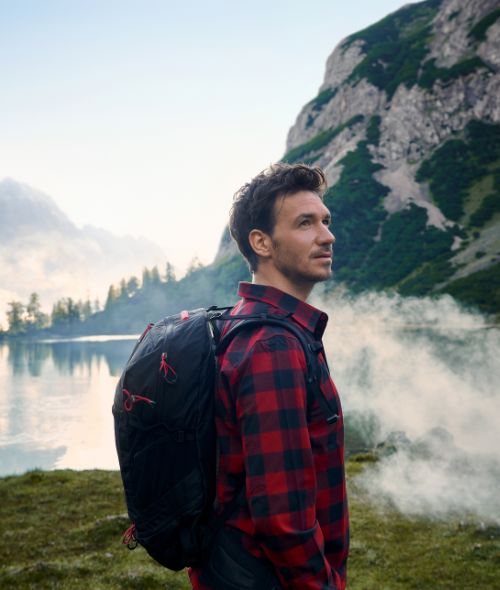 MANUEL FERRIGATO photographs former ski racer Felix Neureuther for the Hypo Vereinsbank campaign against a breathtaking natural backdrop for Kolle Rebbe and Bonaparte Films