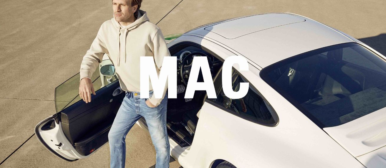 Race car driver Markus Winkelhock in the ‘Ultimate Driver Pants’ by MAC JEANS - photographed by Markus BURKE c/o SONJA HEINTSCHEL on commission for the agency INKCORPORATED