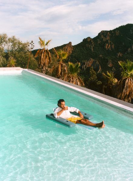 Pierre-Benoit Talbourdet embodies the 'Riviera Friend' for the label CLOSED - Jonas UNGER c/o BIRD PRODUCTION photographs the 2023 Summer collection at the pool in southern France