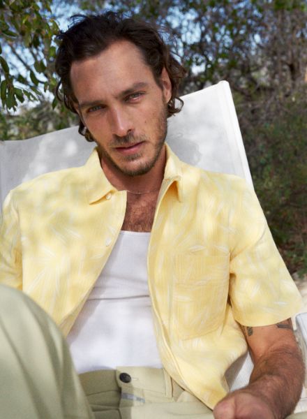 Pierre-Benoit Talbourdet embodies the 'Riviera Friend' for the label CLOSED - Jonas UNGER c/o BIRD PRODUCTION photographs the 2023 Summer collection at the pool in southern France