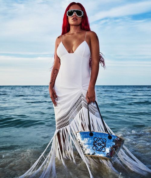The LOEWE ‘Paula’s Ibiza S/S 2023’ campaign banks on superstar musician KAROL G - it was produced by HABITANT PRODUCTIONS