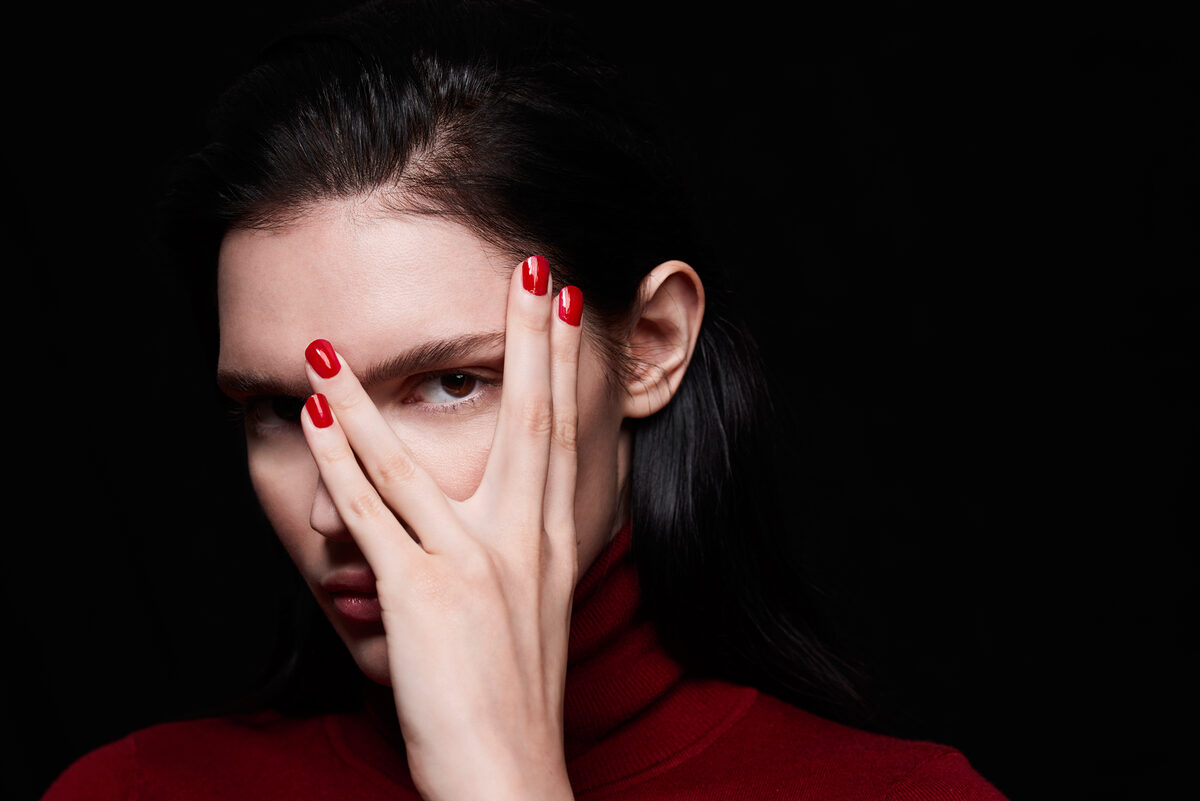 ‘Red Parade’ beauty editorial with iconic model Lila Poter by <b>Julia KELTSCH c/o AVENGER PHOTOGRAPHERS</b> for L’OFFICIEL SINGAPORE