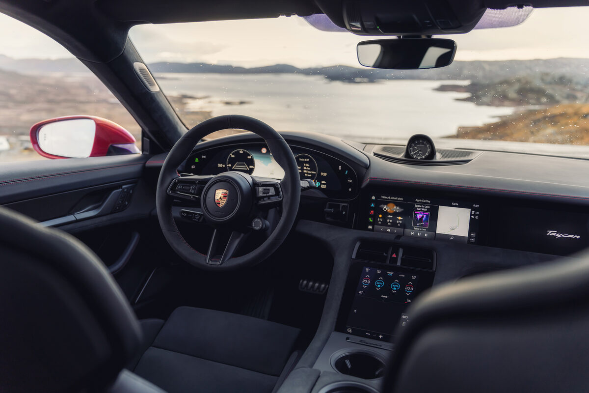 The <b>PORSCHE TAYCAN GTS</b>, photographed by <b>Dejan&amp;Per c/o SEVERIN WENDELER</b>, set against the stunning natural backdrop of Norway