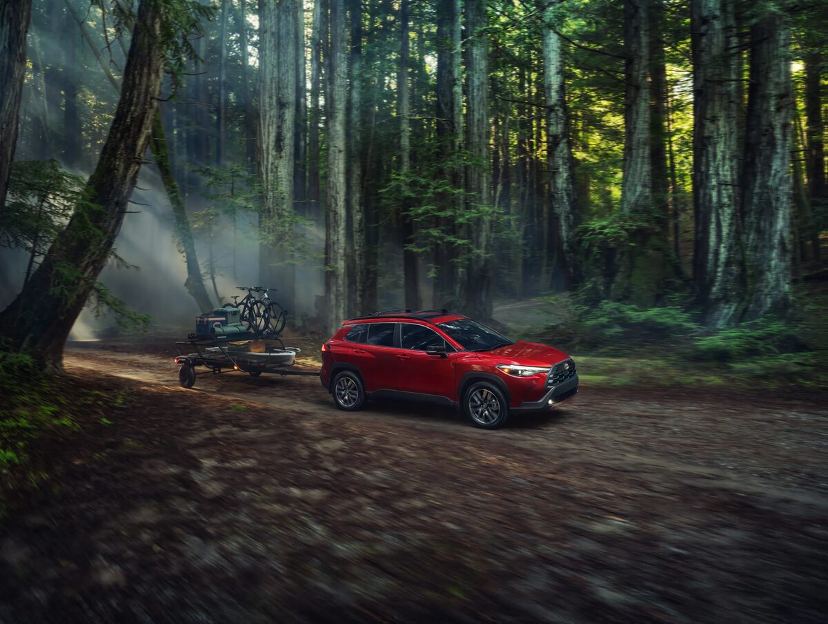 TOYOTA NORTH AMERICA: Dejan &amp; Per photograph the Corolla Cross between forest light and flying water