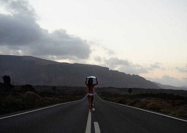 'Live the elements' OY Surf Apparel Lookbook 2017 photographed on the black sandy beach by <b>Mirjam Kluka</b> in Lanzarote