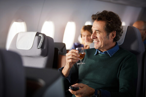 Actor <b>Alan c/o BROYBOOKINGS</b> relaxed in an aircraft for LUFTHANSA image photos