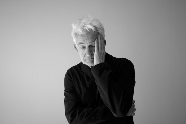 <b>DARIUS RAMAZANI</b> with a portrait of German actor and screenwriter<b> DOMINIC RAACKE</b>